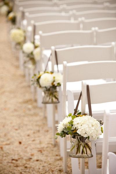 Flowers, On pews up church aisle